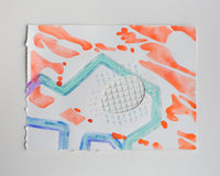 An abstract watercolor painting of flowers on paper.